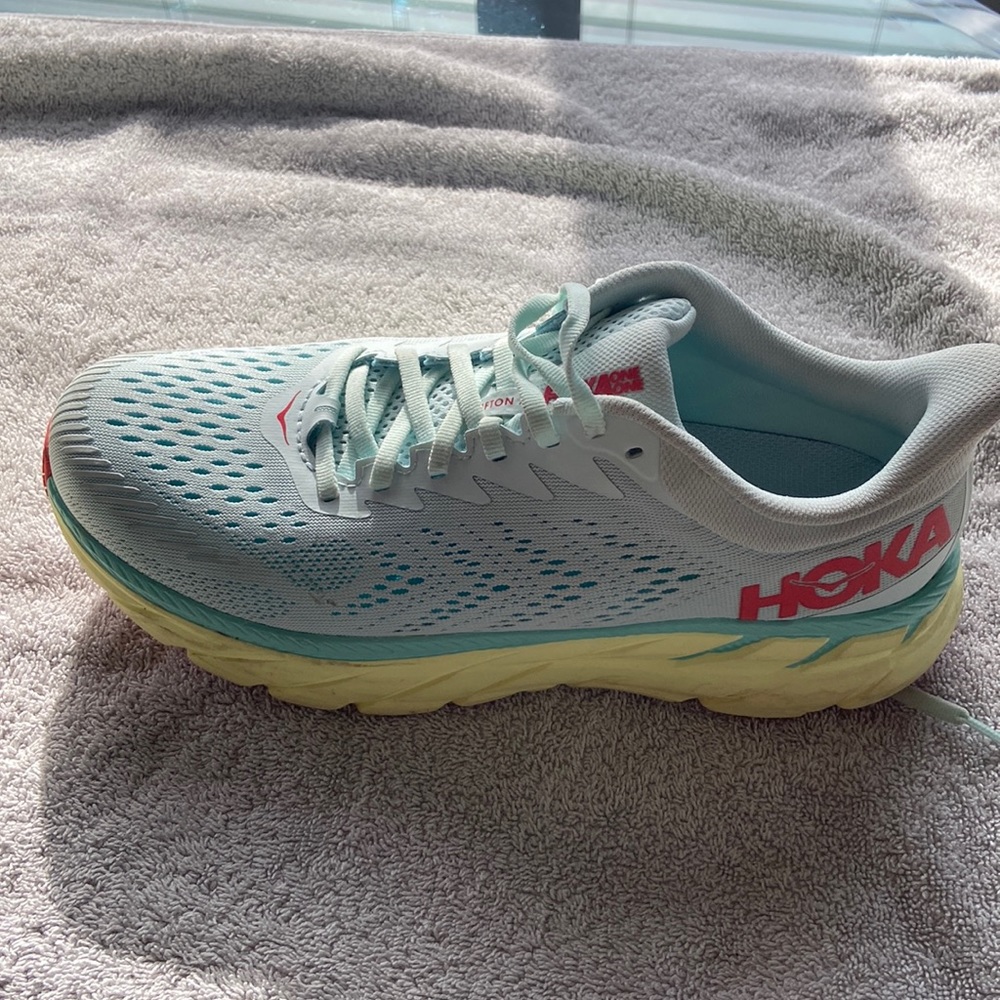 Never worn Hoka size 9 womens sneakers.